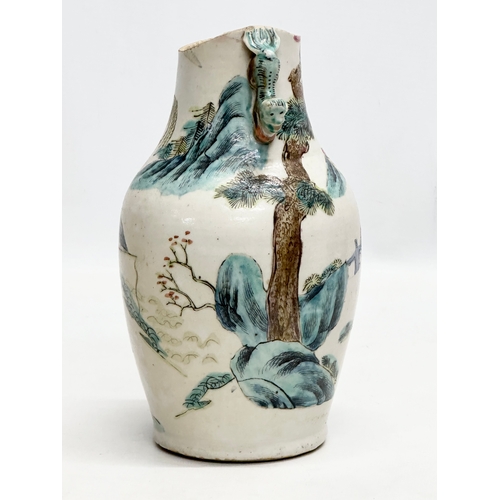 201 - A 19th Century Chinese Late Qing Dynasty vase. Decorated by 2 foo dog handles, god and immortals on ... 