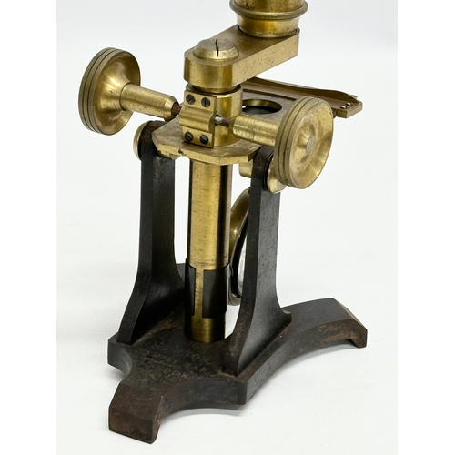 198 - Newton & Co. Temple Bar London. A Late 19th Century bras microscope by Newton & Co. Circa 1870-1890.... 