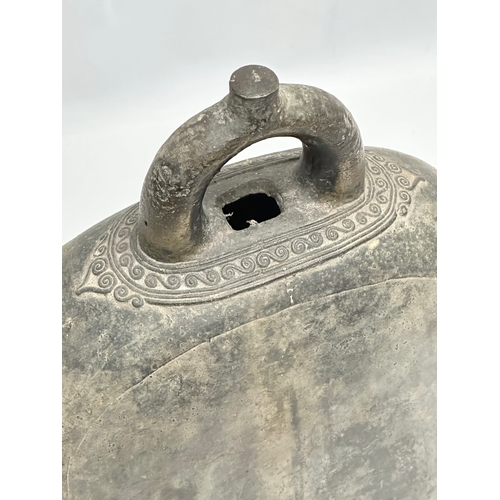 206 - A large 19th Century Burmese bronze bell. 23x14x36cm.