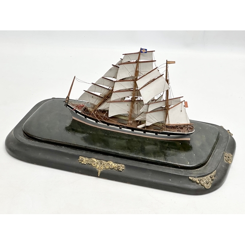 207 - A Late 19th/Early 20th Century model ship in glass domed case. 38x20x28cm.