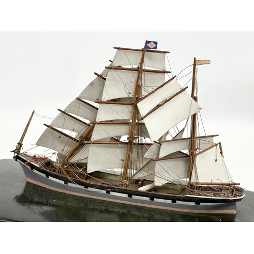 207 - A Late 19th/Early 20th Century model ship in glass domed case. 38x20x28cm.