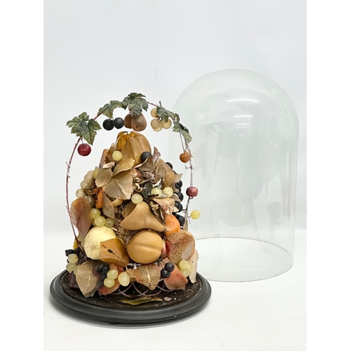 209 - A large Late 19th Century waxed fruit display in domed glass case. 33x50cm