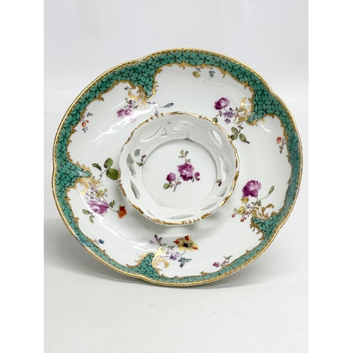 211 - A Late 19th Century Meissen porcelain cup and saucer.