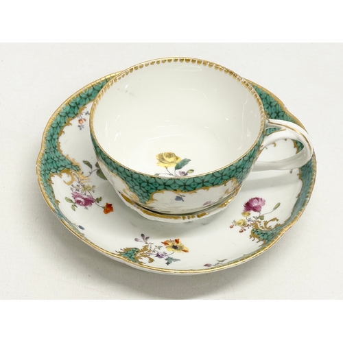 211 - A Late 19th Century Meissen porcelain cup and saucer.