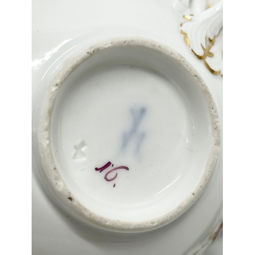 211 - A Late 19th Century Meissen porcelain cup and saucer.