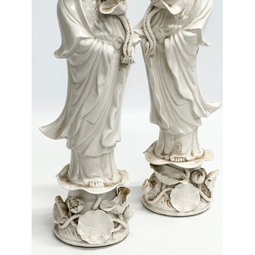 227 - A pair of tall Early 20th Century Chinese Blanc de Chine figurines. 37cm.