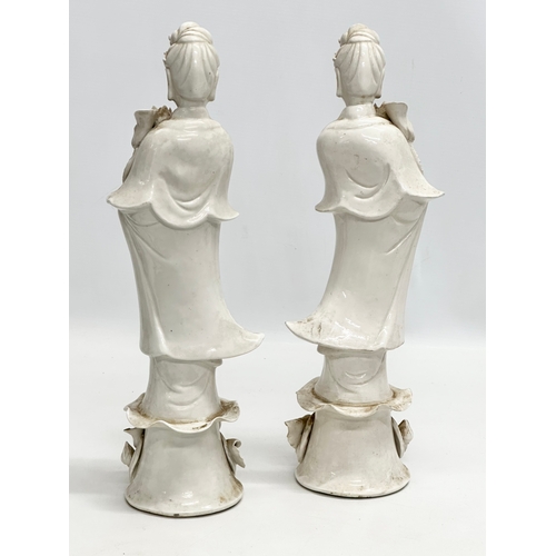 227 - A pair of tall Early 20th Century Chinese Blanc de Chine figurines. 37cm.