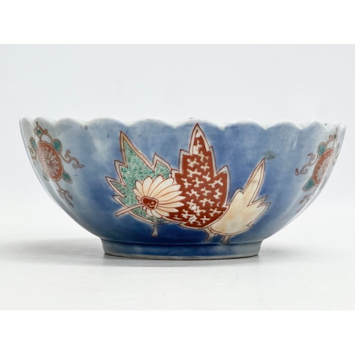 229 - A Mid 20th Century Japanese footed bowl with scalloped rim. 22x9cm