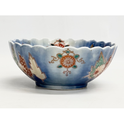 229 - A Mid 20th Century Japanese footed bowl with scalloped rim. 22x9cm