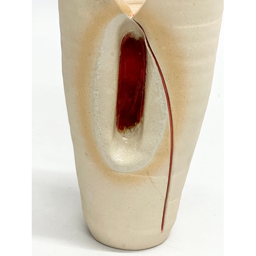 455 - A Mid Century glazed stoneware vase by Diem pottery. 21cm.