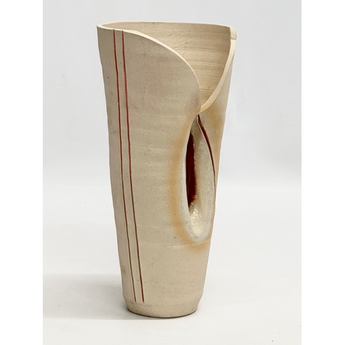 455 - A Mid Century glazed stoneware vase by Diem pottery. 21cm.