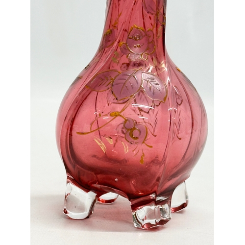 233 - An Early 20th Century cranberry glass footed vase. 22cm