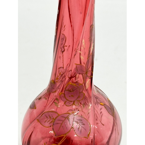 233 - An Early 20th Century cranberry glass footed vase. 22cm