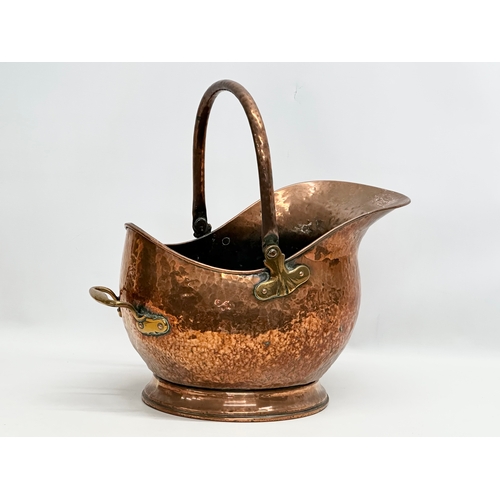 241 - A Victorian copper coal scuttle. 42x28x27cm