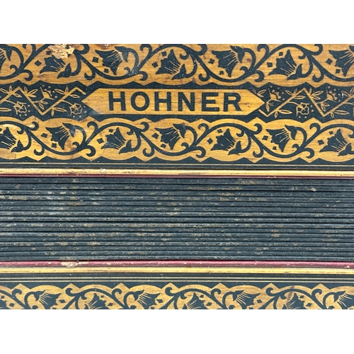 14 - A Late 19th/Early 20th Century Hohner carved fretwork accordion.