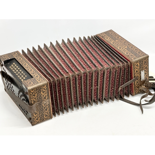 14 - A Late 19th/Early 20th Century Hohner carved fretwork accordion.