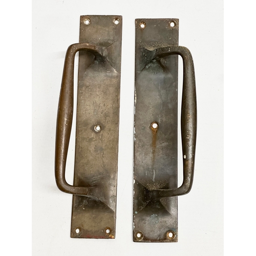 244 - A collection of 19th and 20th Century door furniture. A pair of Late 19th Century brass and turned w... 