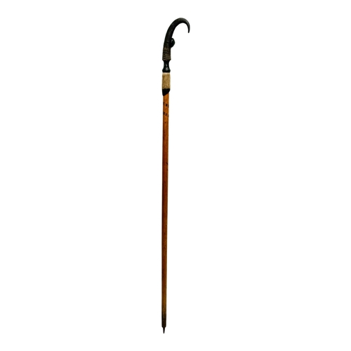 246 - St Beatenberg. A Late 19th/Early 20th Century walking stick. With a chamois horn handle. 100cm