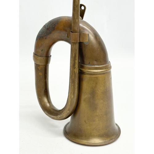 448 - An Early 20th Century brass car horn. 36cm