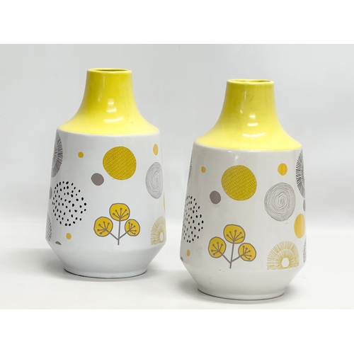 189 - A pair of 1970’s Mid Century pottery vases. 16x30cm