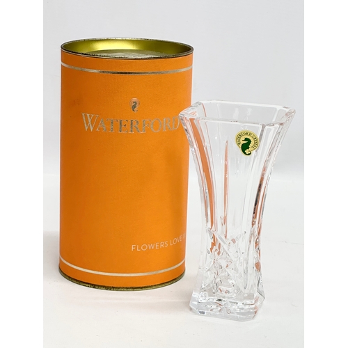 453 - Waterford Crystal. A Waterford Gesture Bud Vase 15cm. A Lismore Votive candleholder 10x3cm.