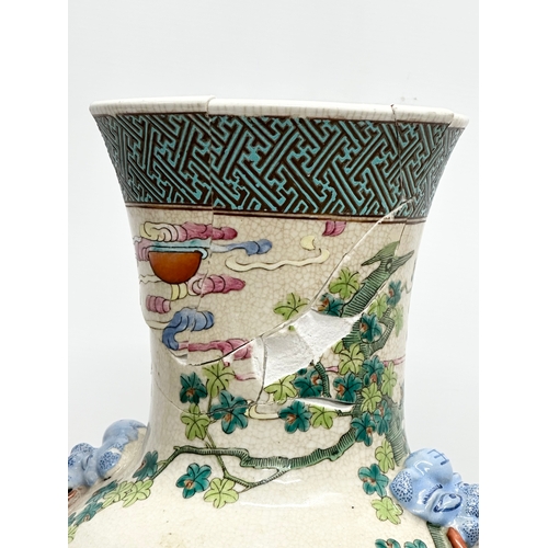 15 - A large Late Qing Dynasty Chinese Famille Rose pot. Decorated with hand painted peacocks, lotus leav... 