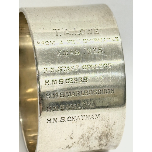 537 - A Navy themed silver napkin ring. From a few shipmates, Xmas 1925. R.N. Staff College, H.M.S Ceres, ... 