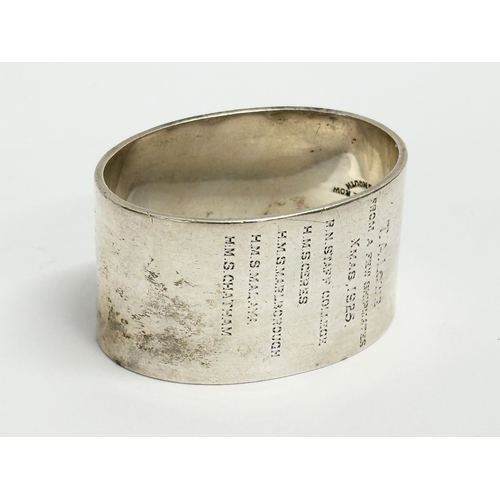 537 - A Navy themed silver napkin ring. From a few shipmates, Xmas 1925. R.N. Staff College, H.M.S Ceres, ... 