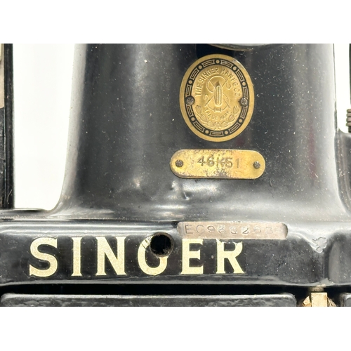 548 - An Early 20th Century Singer sewing machine. Model 46K51.