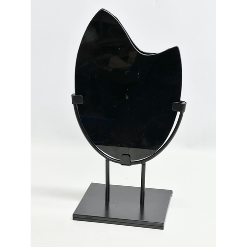 549 - A large Modernist glass sculpture on metal stand. 24x42cm