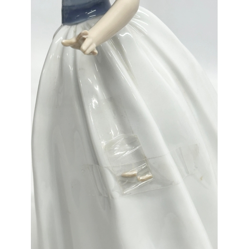 550 - A large Lladro “So Beautiful” figurine. 6418. 31cm.