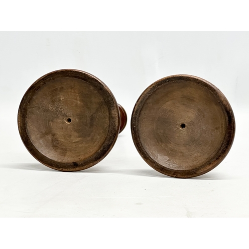 556 - A pair of Late 19th Century Victorian turned pearwood/fruitwood candlsticks. 26cm