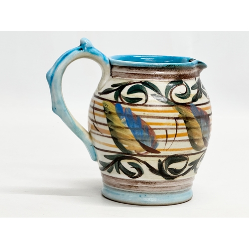 557 - Glyn Colledge. A vintage hand painted glazed stoneware jug by Glyn Colledge for Denby. 13x10x13cm