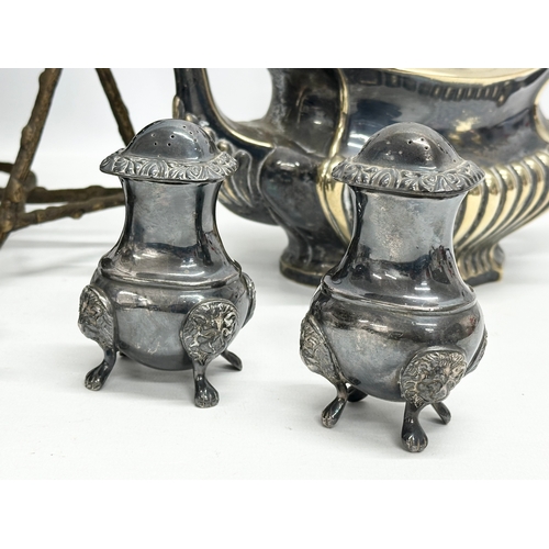 561 - A quantity of 19th and 20th Century silver plate. Spirit kettle, 2 teapots, large salts and salt and... 