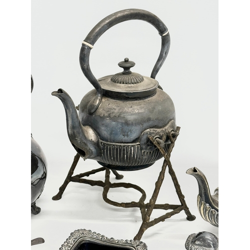 561 - A quantity of 19th and 20th Century silver plate. Spirit kettle, 2 teapots, large salts and salt and... 