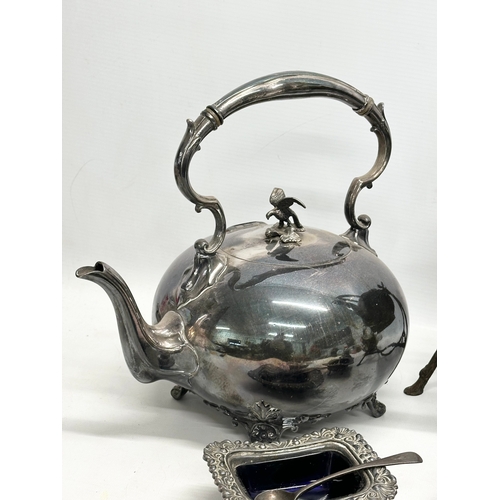 561 - A quantity of 19th and 20th Century silver plate. Spirit kettle, 2 teapots, large salts and salt and... 