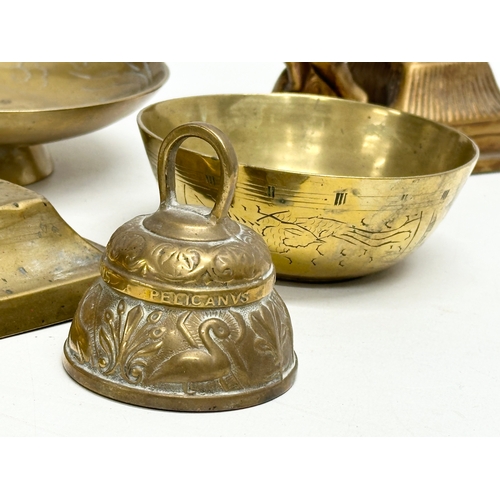 563 - A quantity of 19th and 20th Century brassware. Together with a pair of modern gilt ceramic cherub ca... 