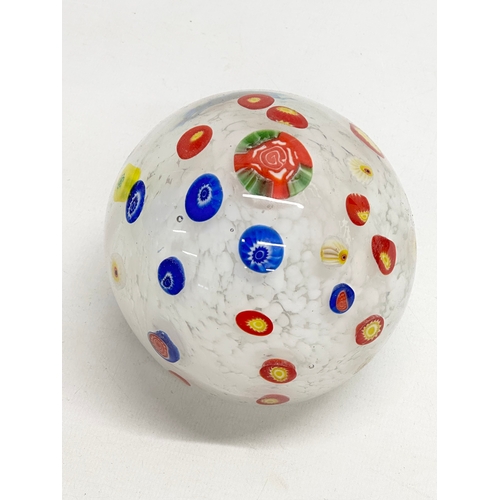 564 - A large art glass paperweight. 10.5x11cm.