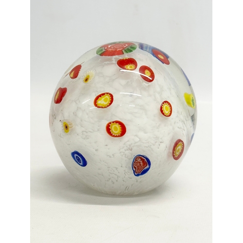 564 - A large art glass paperweight. 10.5x11cm.