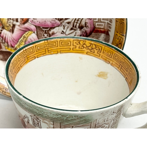 257 - A large Mid 19th Century Victorian Chinese style cup and saucer. Saucer 16cm.