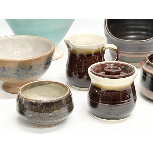 567 - A collection of studio pottery.