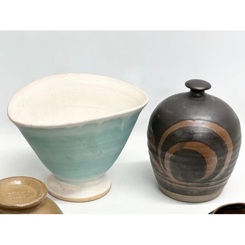 567 - A collection of studio pottery.