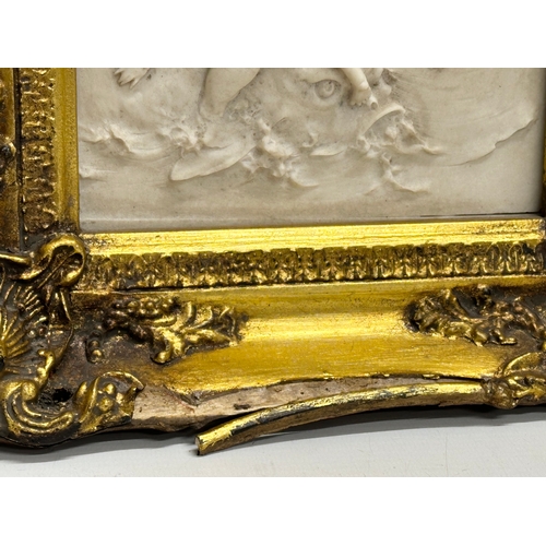 261 - A Late 20th Century gilt framed “Nymph and putti” carved panel. From the original by Francois Duques... 