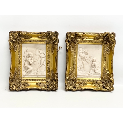 262 - A set of 4 Late 20th Century gilt framed wall plaques with carved cherub panels. Marked P.T. Seymour... 