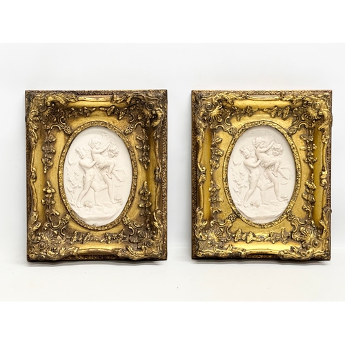 262 - A set of 4 Late 20th Century gilt framed wall plaques with carved cherub panels. Marked P.T. Seymour... 