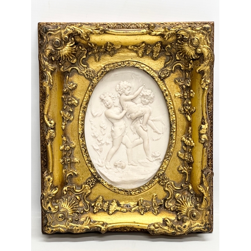 262 - A set of 4 Late 20th Century gilt framed wall plaques with carved cherub panels. Marked P.T. Seymour... 