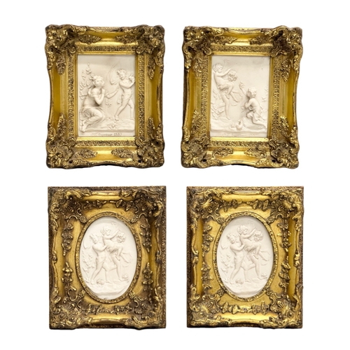 262 - A set of 4 Late 20th Century gilt framed wall plaques with carved cherub panels. Marked P.T. Seymour... 