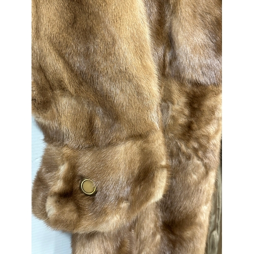 572 - An S. Jaffa LTD. A vintage fur coat.