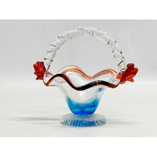 577 - A Mid 20th Century art glass basket. 15x12x13cm.