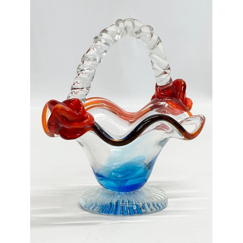 577 - A Mid 20th Century art glass basket. 15x12x13cm.